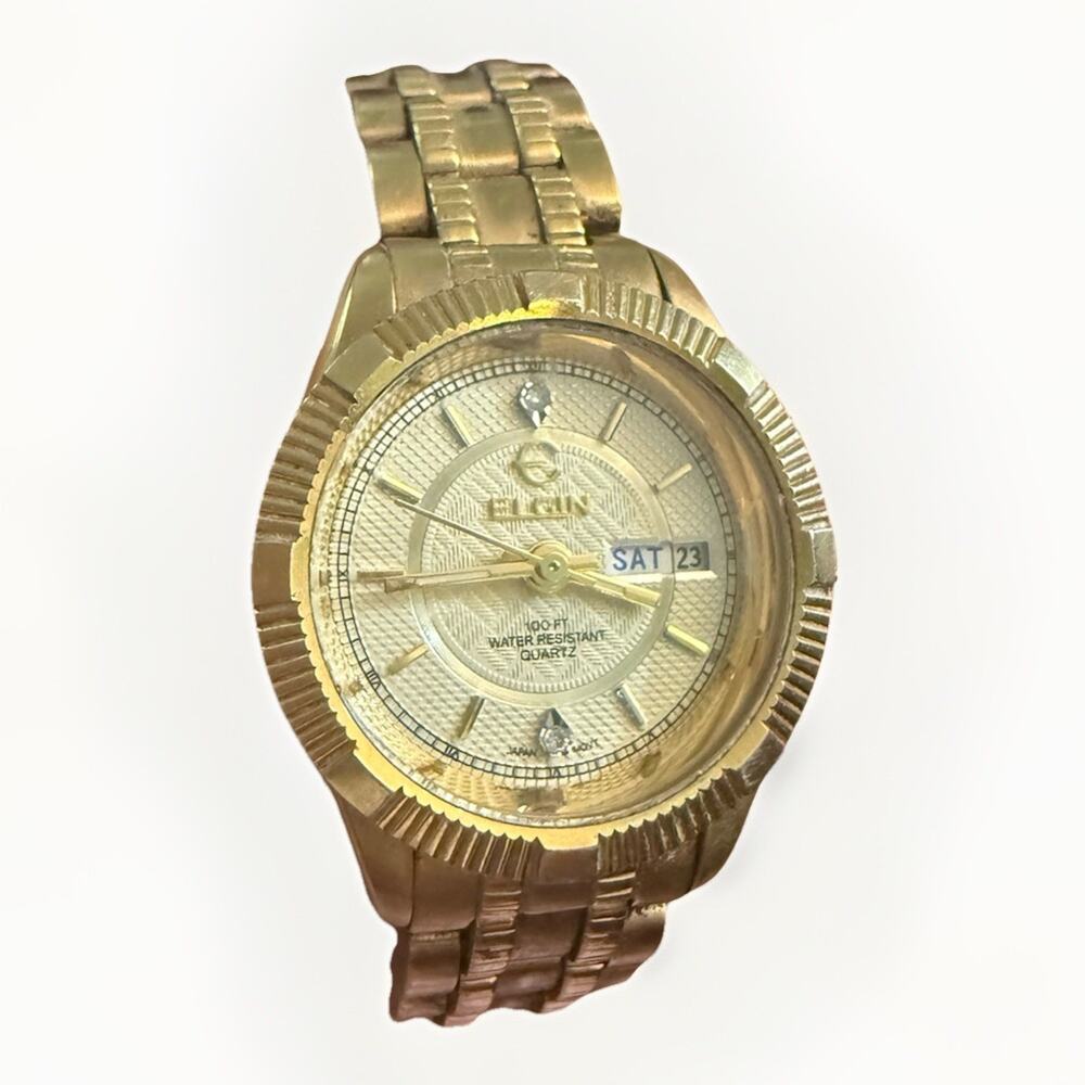 Elgin women’s Gold Tone Small Quartz Watch Day/Date 100ft Water Resistant